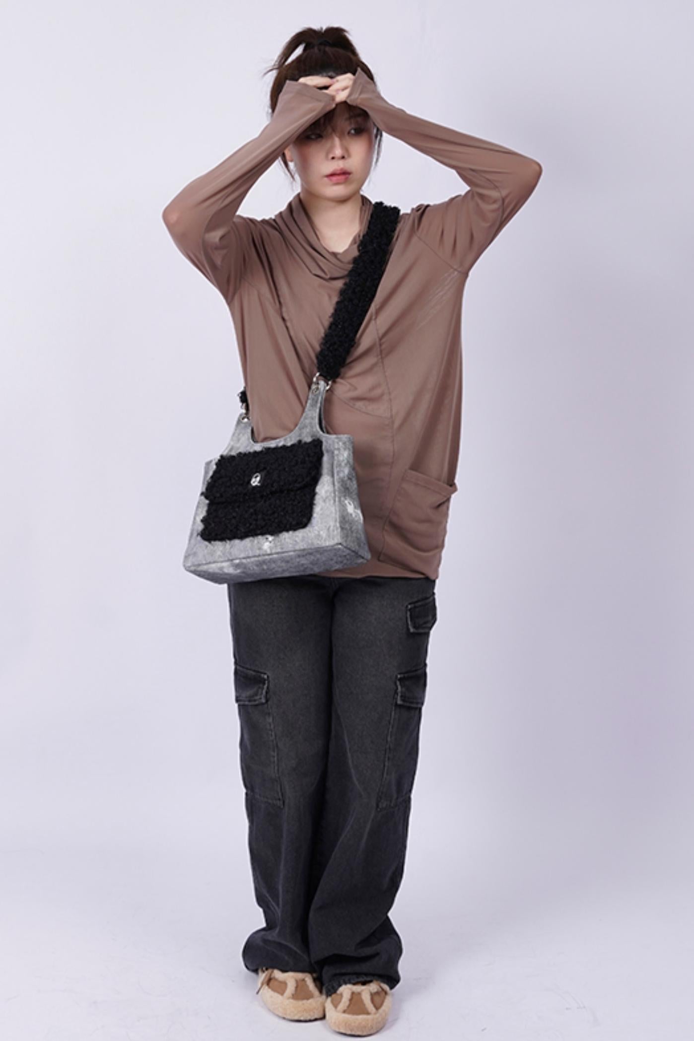 Luxuriöse, strukturierte Crossbody-Tasche
