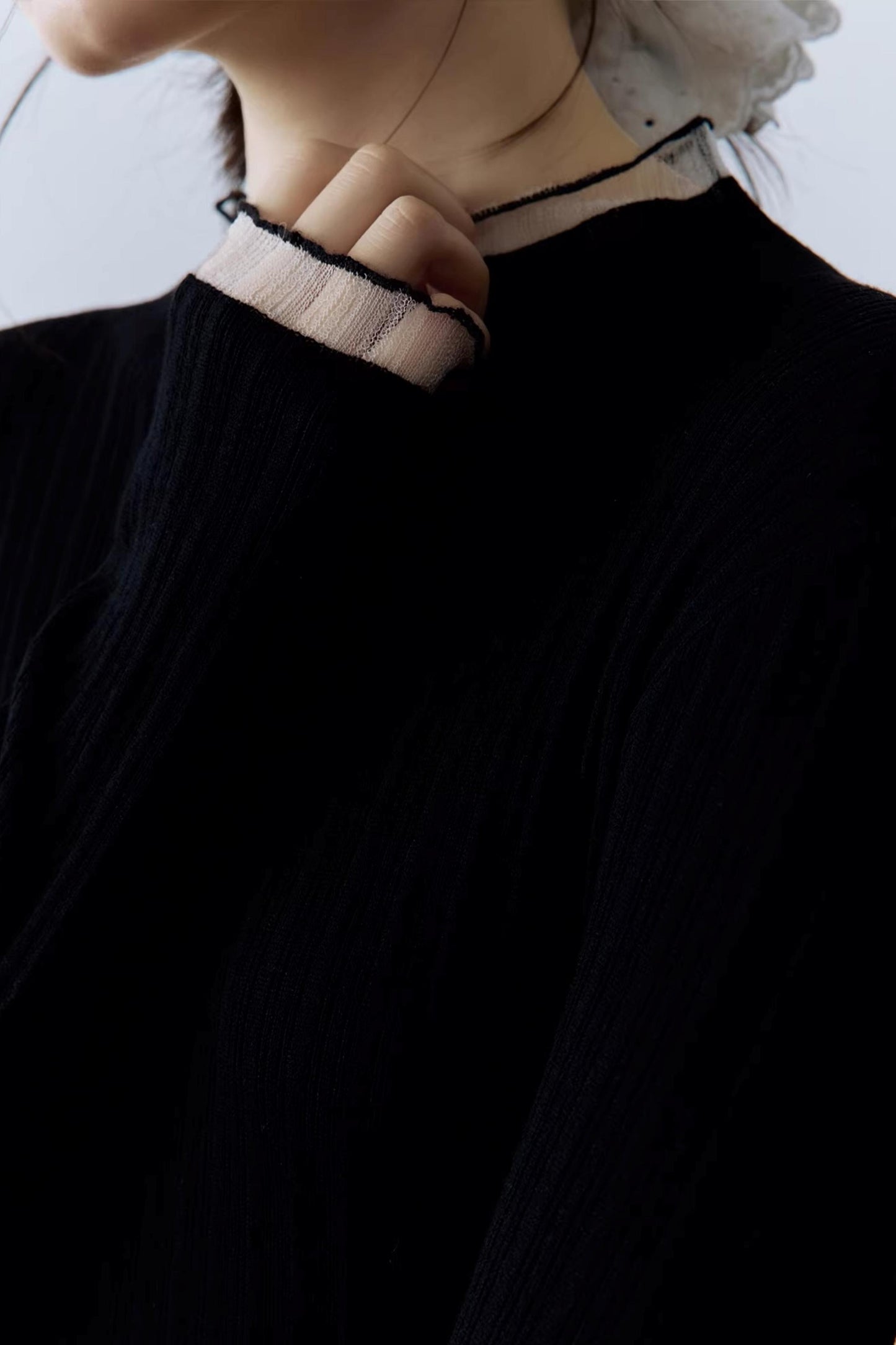 Schwarzes geripptes Stricktop
