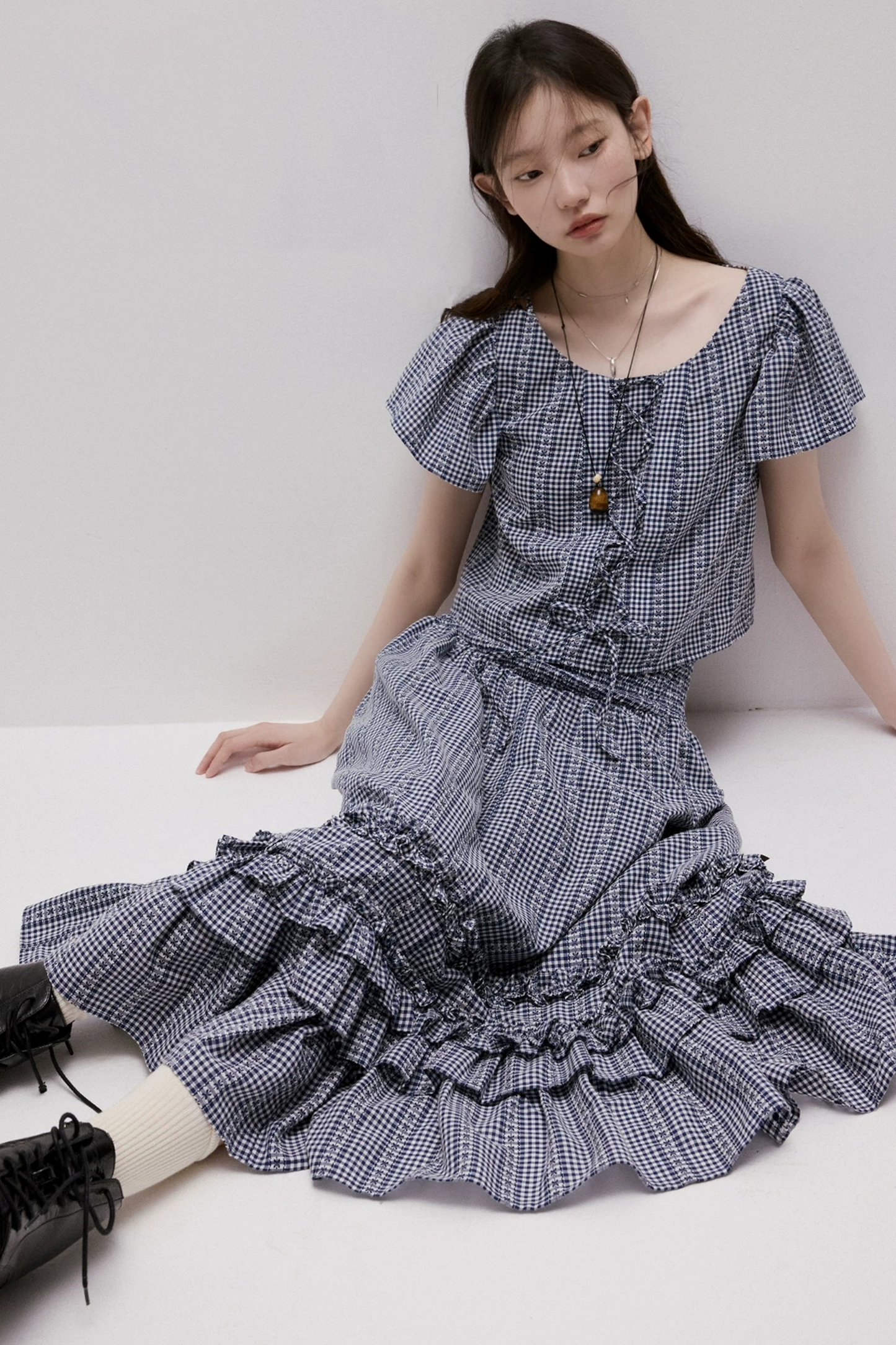 Maglia vichy blu con lacci