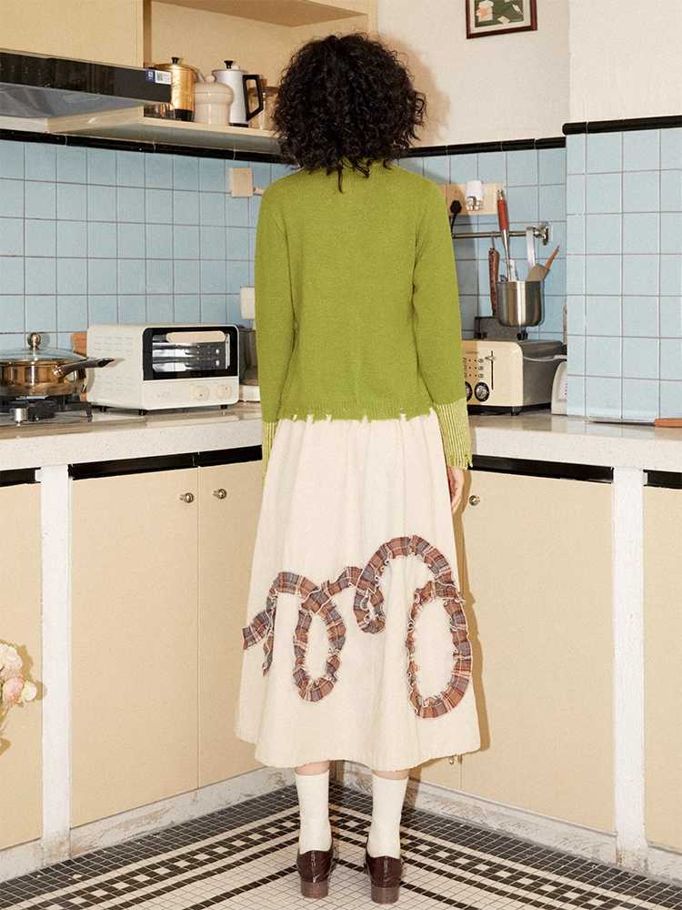 Gelbgrüner Strickpullover