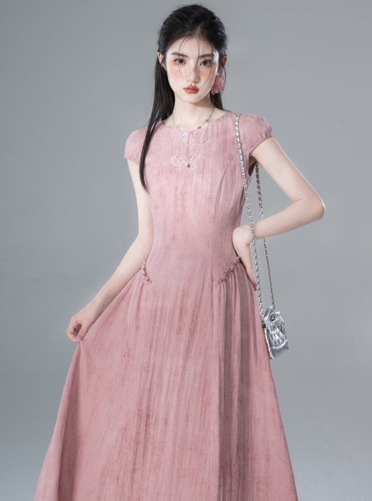 Pflaumenrosa lila Schmetterlingskleid