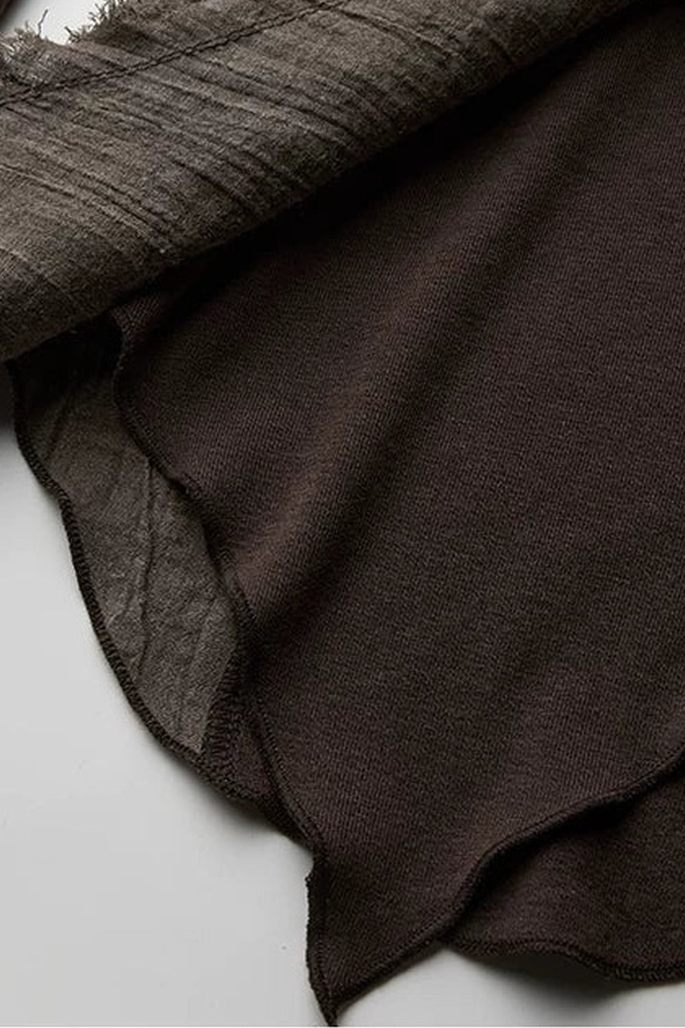 Asymmetrical Eye Embroidery Knit Top