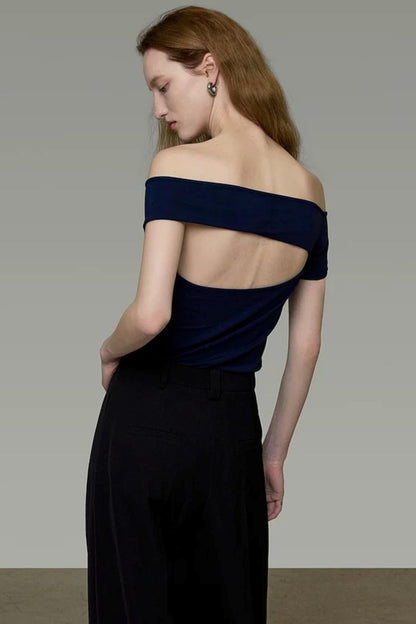 Elegantes marineblaues rückenfreies Oberteil
