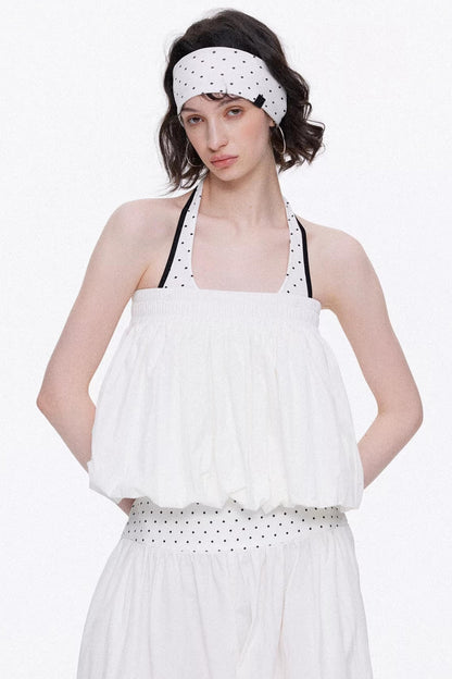 Elegant off-white minimalist knitted set featuring a tube top