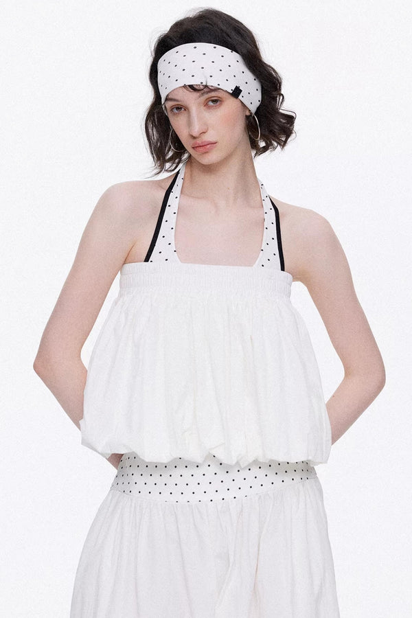 Elegant off-white minimalist knitted set featuring a tube top