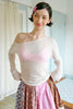 Blusa bianca sulle spalle in tessuti trasparenti