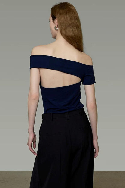 Elegantes marineblaues rückenfreies Oberteil
