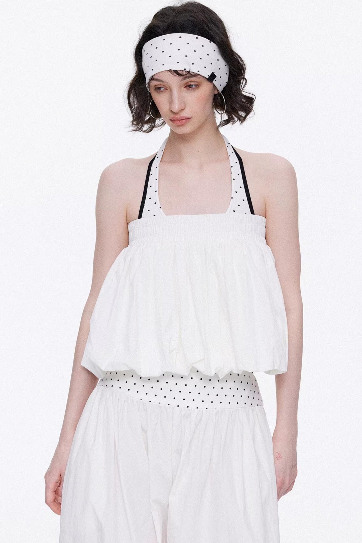Elegant off-white minimalist knitted set featuring a tube top