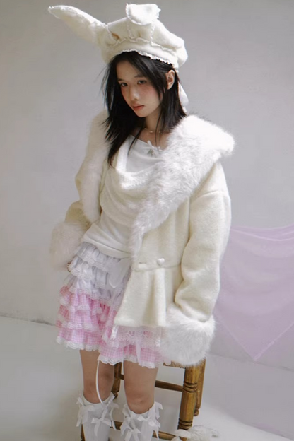 Gestricktes Oberteil mit drapiertem Kragen