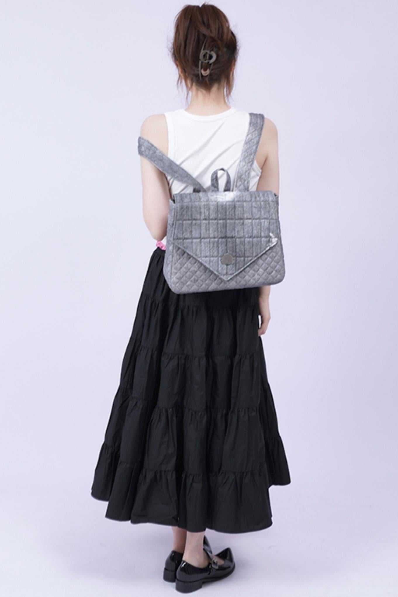 Triangle Flap Rucksack Bag