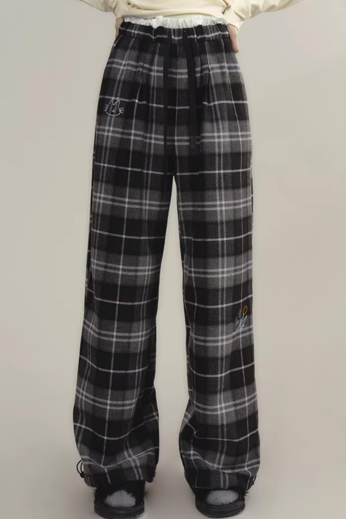 Bestickte Wollhose mit Karomuster