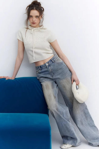 Blaue Vintage-Rosen-Jeanshose