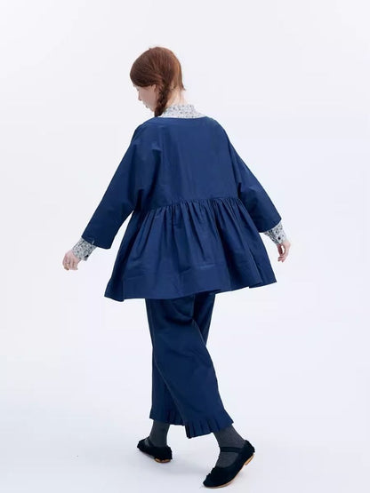 Shiny color sapphire hem smock.