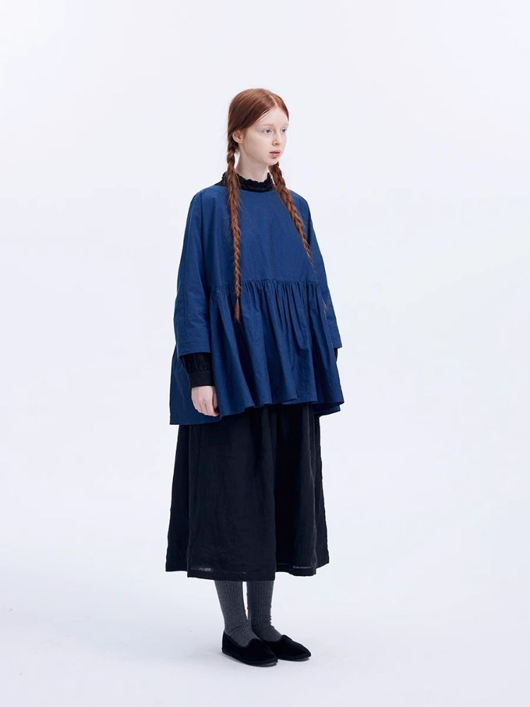 Shiny color sapphire hem smock.