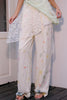 Pantaloni beige senza patta posteriore