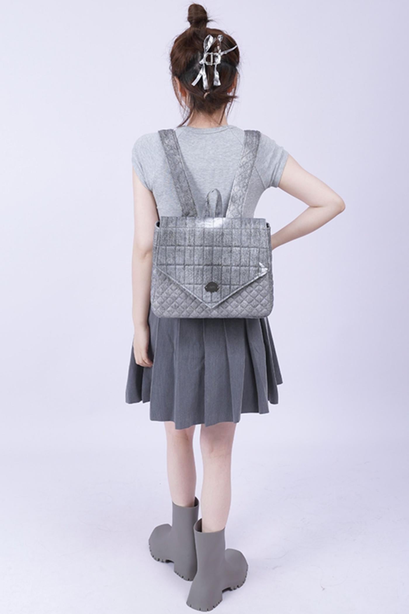 Triangle Flap Rucksack Bag