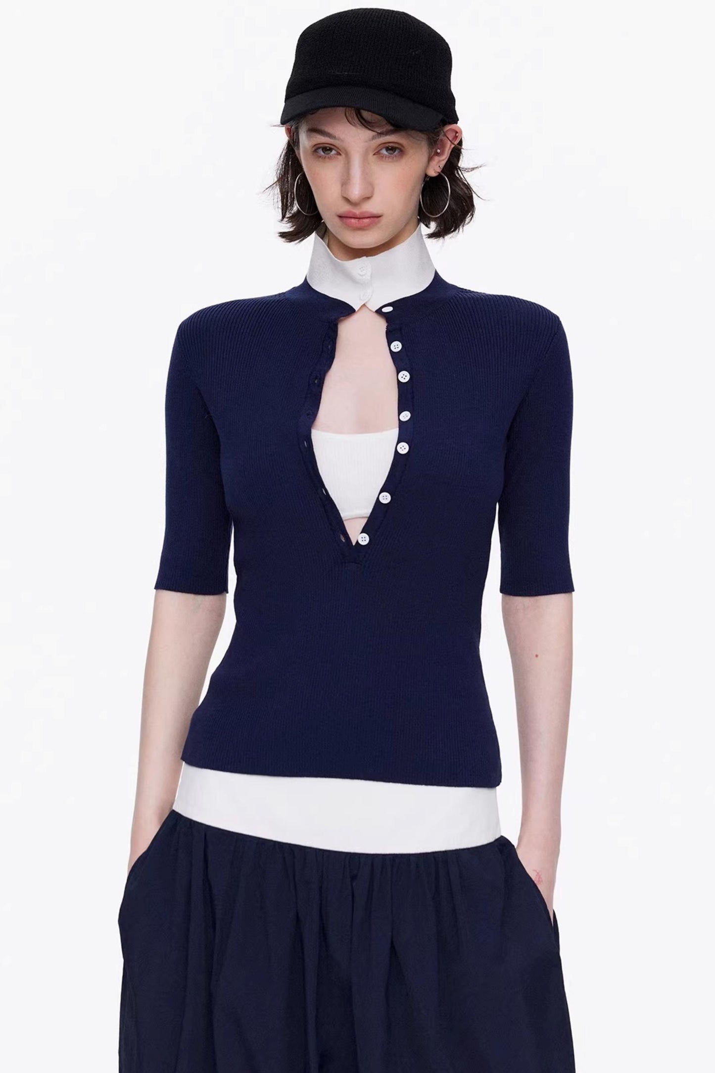 Elegant navy blue and white color-blocked lyocell knit top