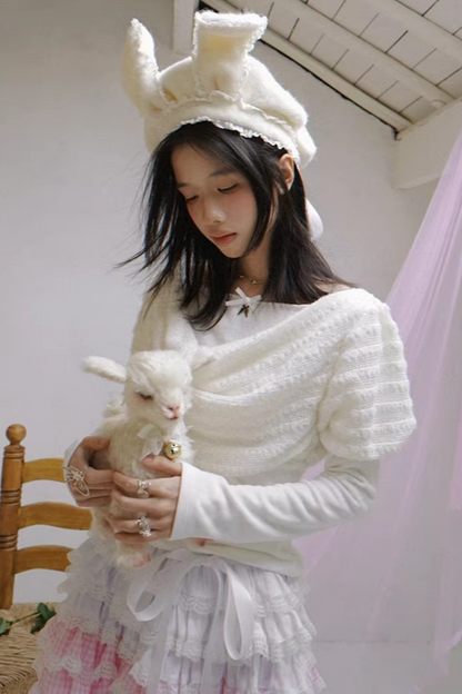 Gestricktes Oberteil mit drapiertem Kragen