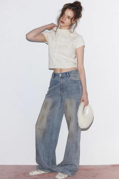 Blaue Vintage-Rosen-Jeanshose
