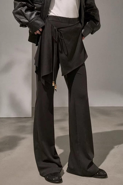 Edgy black high-waisted patchwork flared trousers for streetwear style