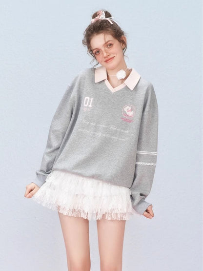 Ballet style embroidered jersey pullover sweater