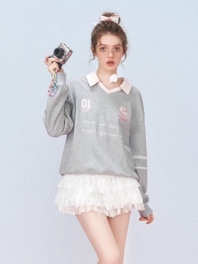 Ballet style embroidered jersey pullover sweater