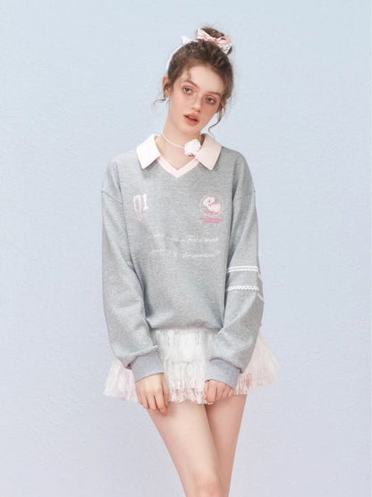 Ballet style embroidered jersey pullover sweater