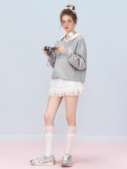 Ballet style embroidered jersey pullover sweater