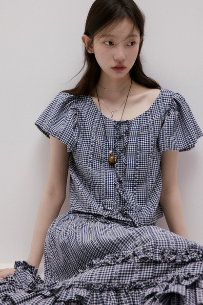 Maglia vichy blu con lacci