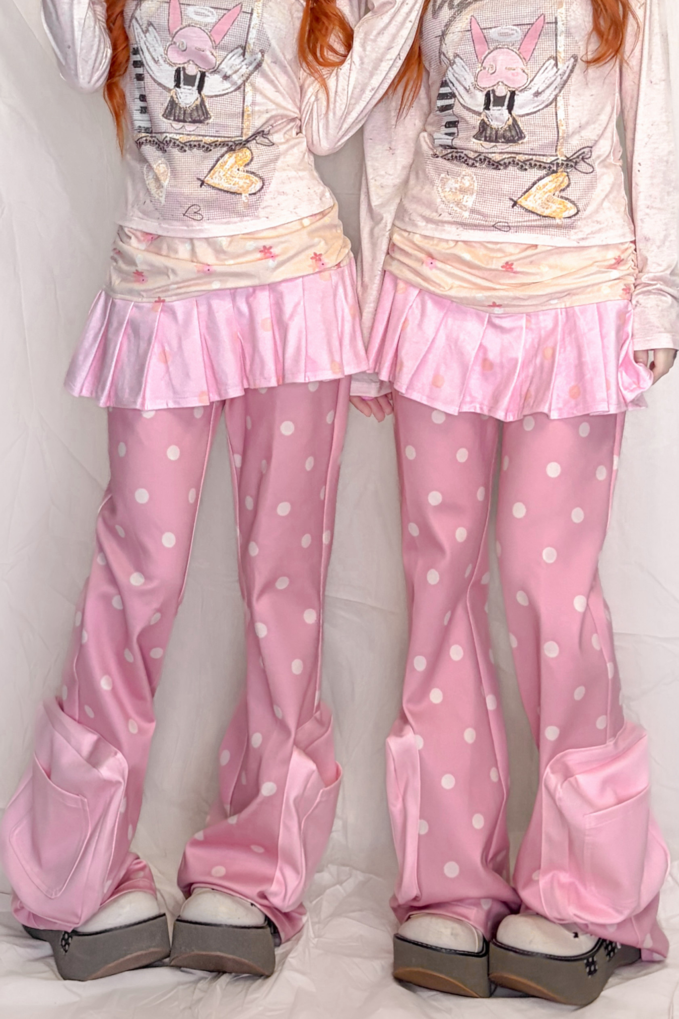 Rosa gepunktete Sweatpants