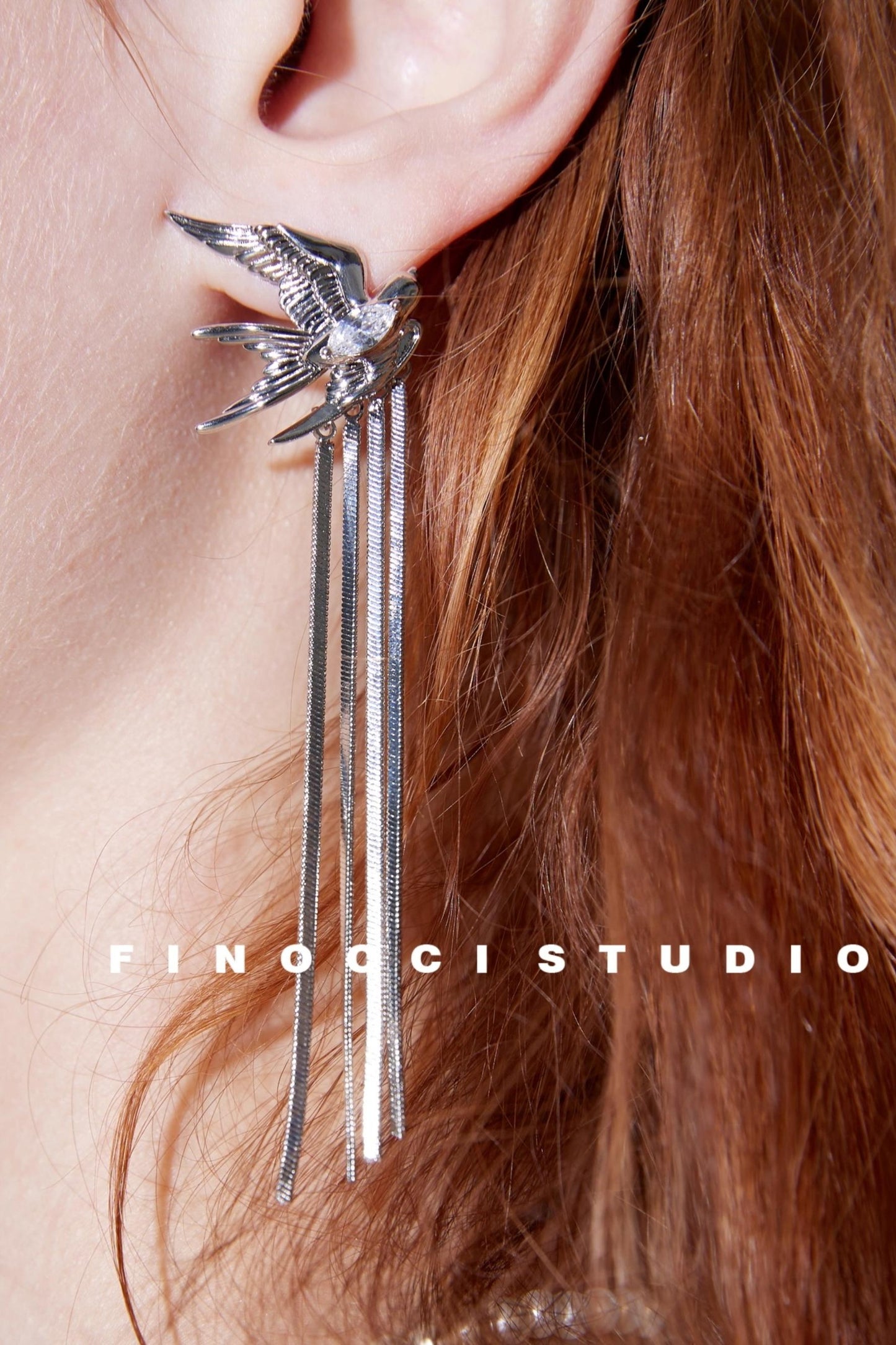 Annual Platinum Swallow Earrings