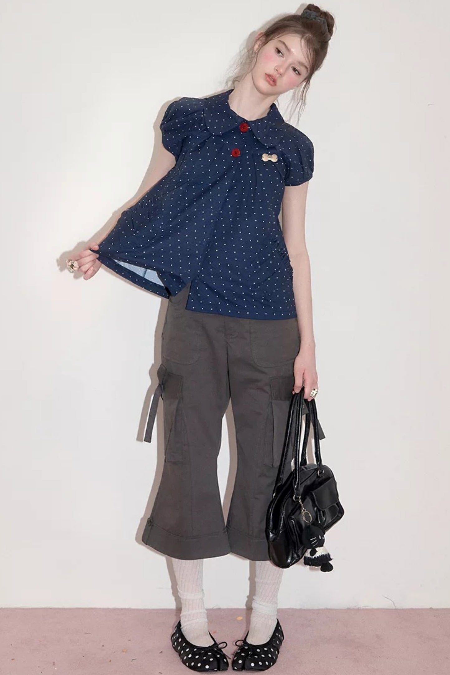 Camicia blu scuro a pois con colletto Peter Pan