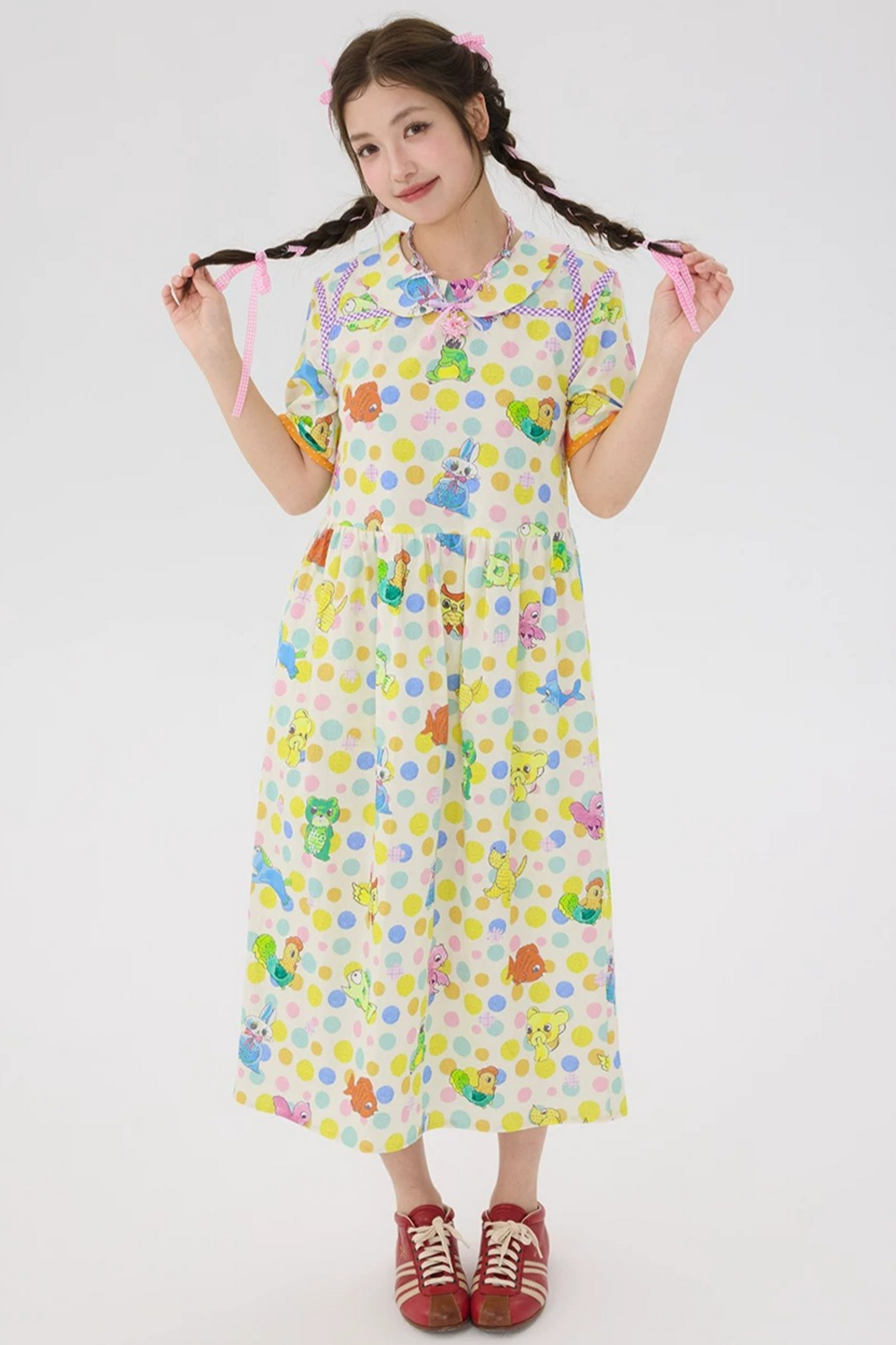 Robe blanc cassé à pois et graffiti