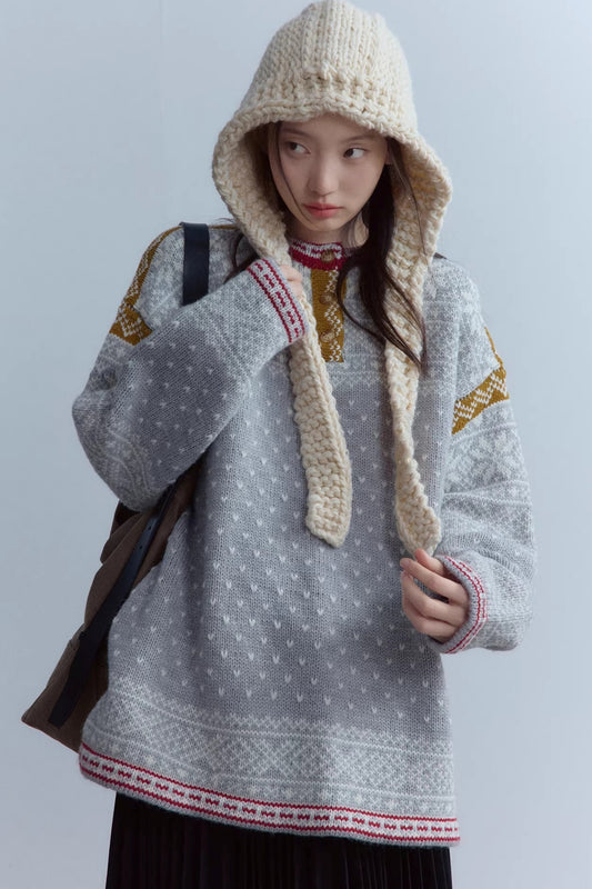 Pull en laine gris flocon de neige