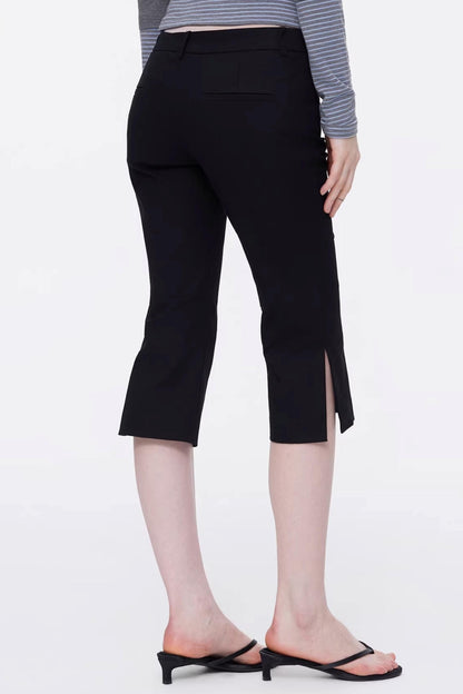 Sleek black low-waist equestrian capri trousers for a trendy Y2K look back view