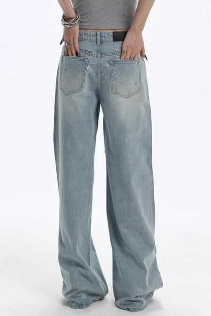 Blaue Jeans mit Edelsteinen und Diamanten