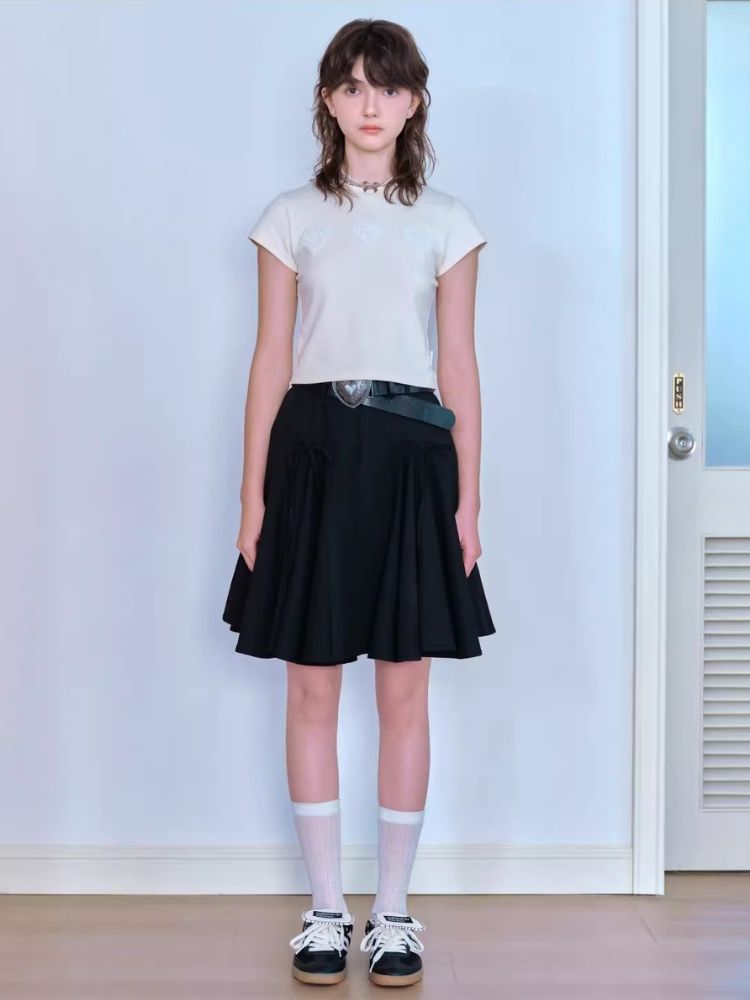 Bow tie pleated skirt