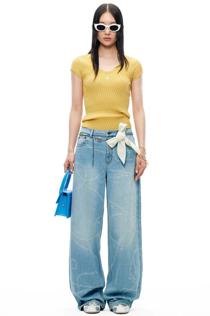 Washed Laser Print Denim Pants