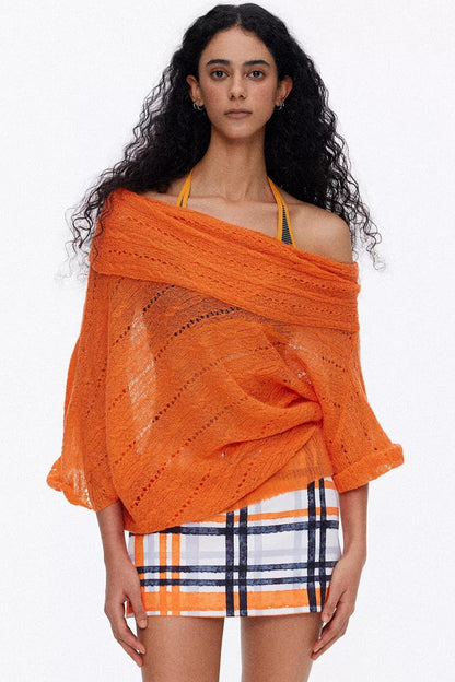 Vibrant orange one-shoulder oversized knit blouse for a bold summer look
