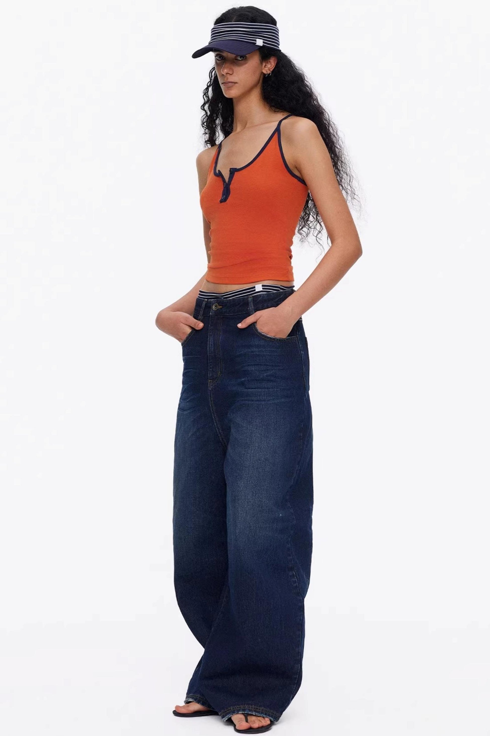 Sporty orange color-block vest close-up