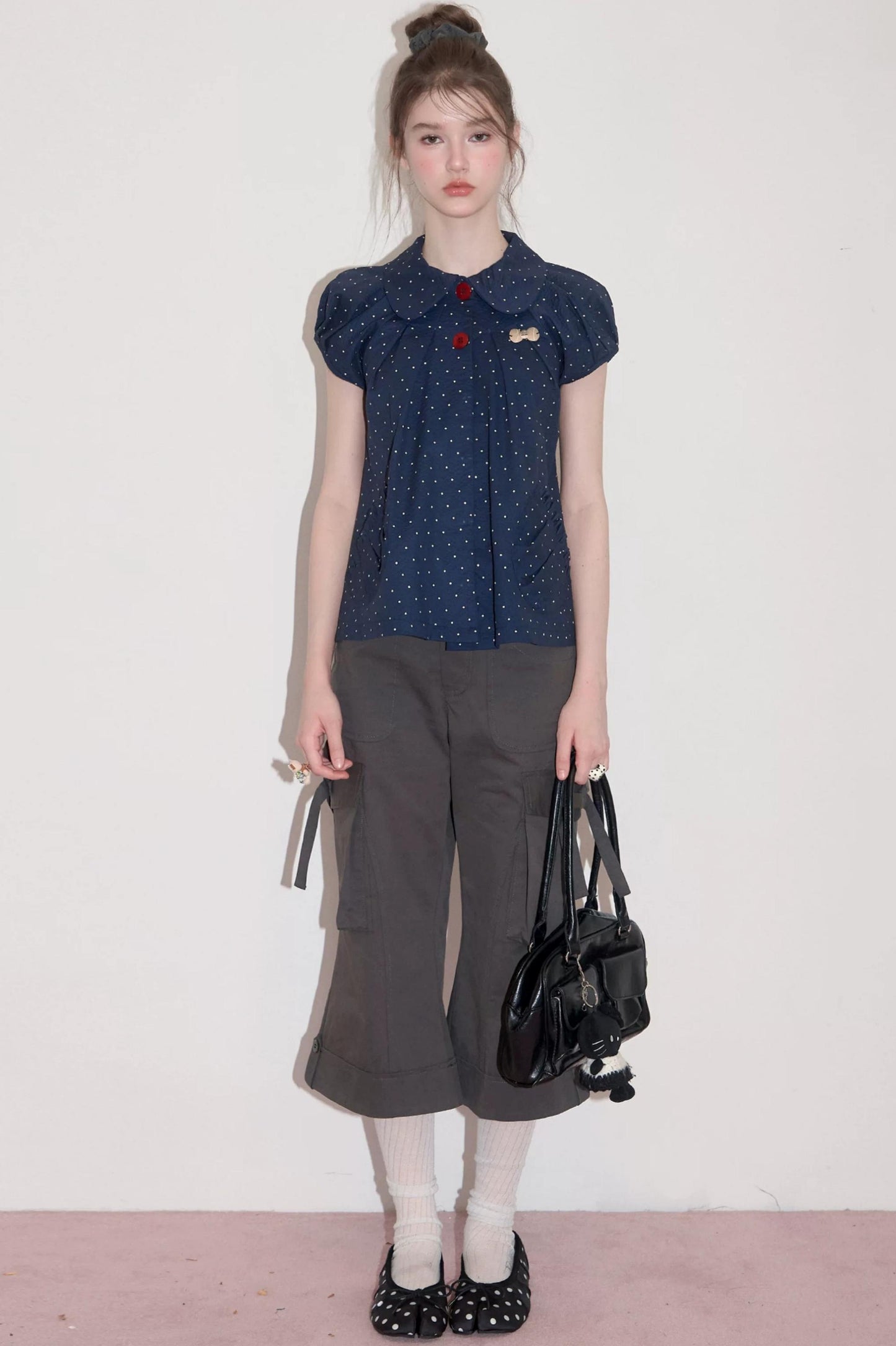 Camicia blu scuro a pois con colletto Peter Pan