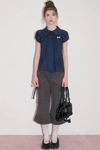 Camicia blu scuro a pois con colletto Peter Pan