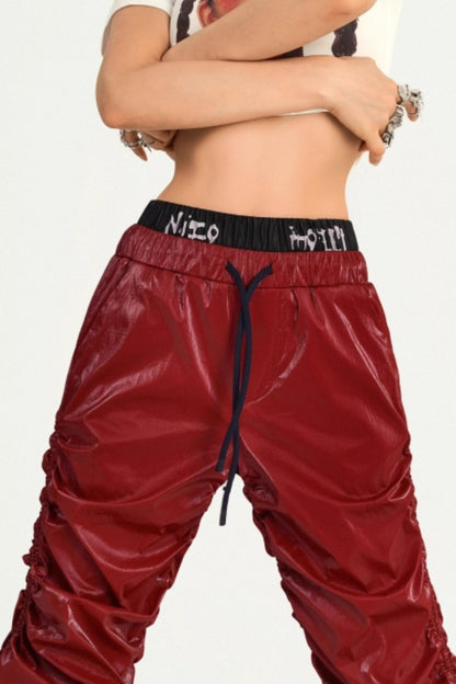 Red Pleated Leather Pants