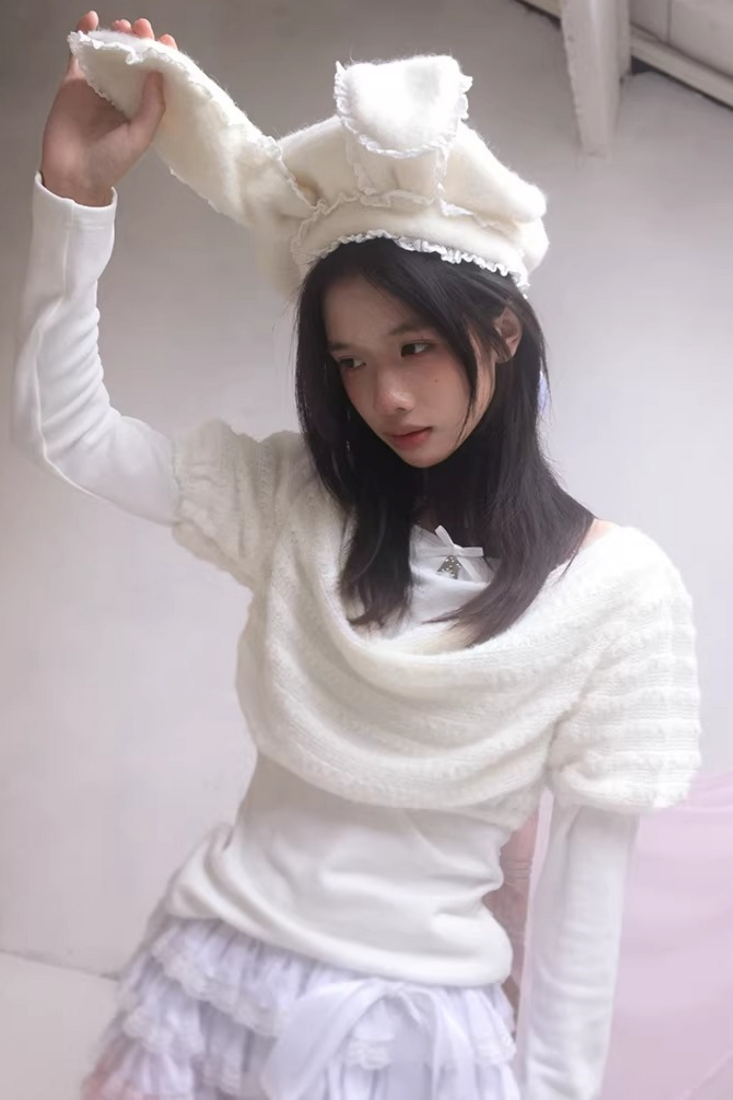 Gestricktes Oberteil mit drapiertem Kragen