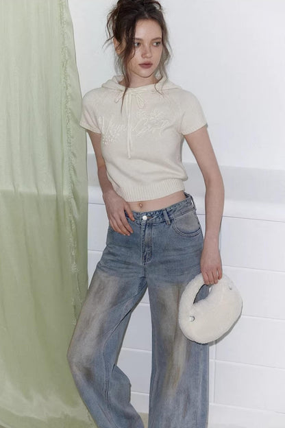 Blaue Vintage-Rosen-Jeanshose