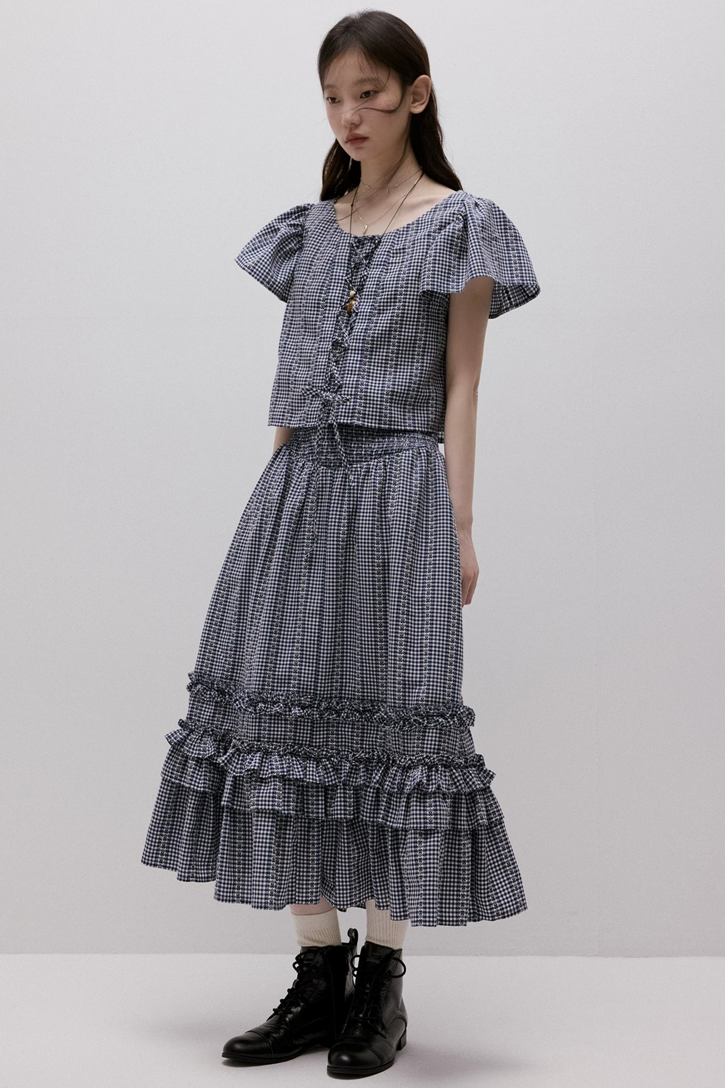 Maglia vichy blu con lacci