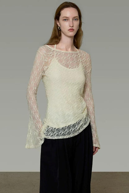 Blusa elegante in pizzo con spalline
