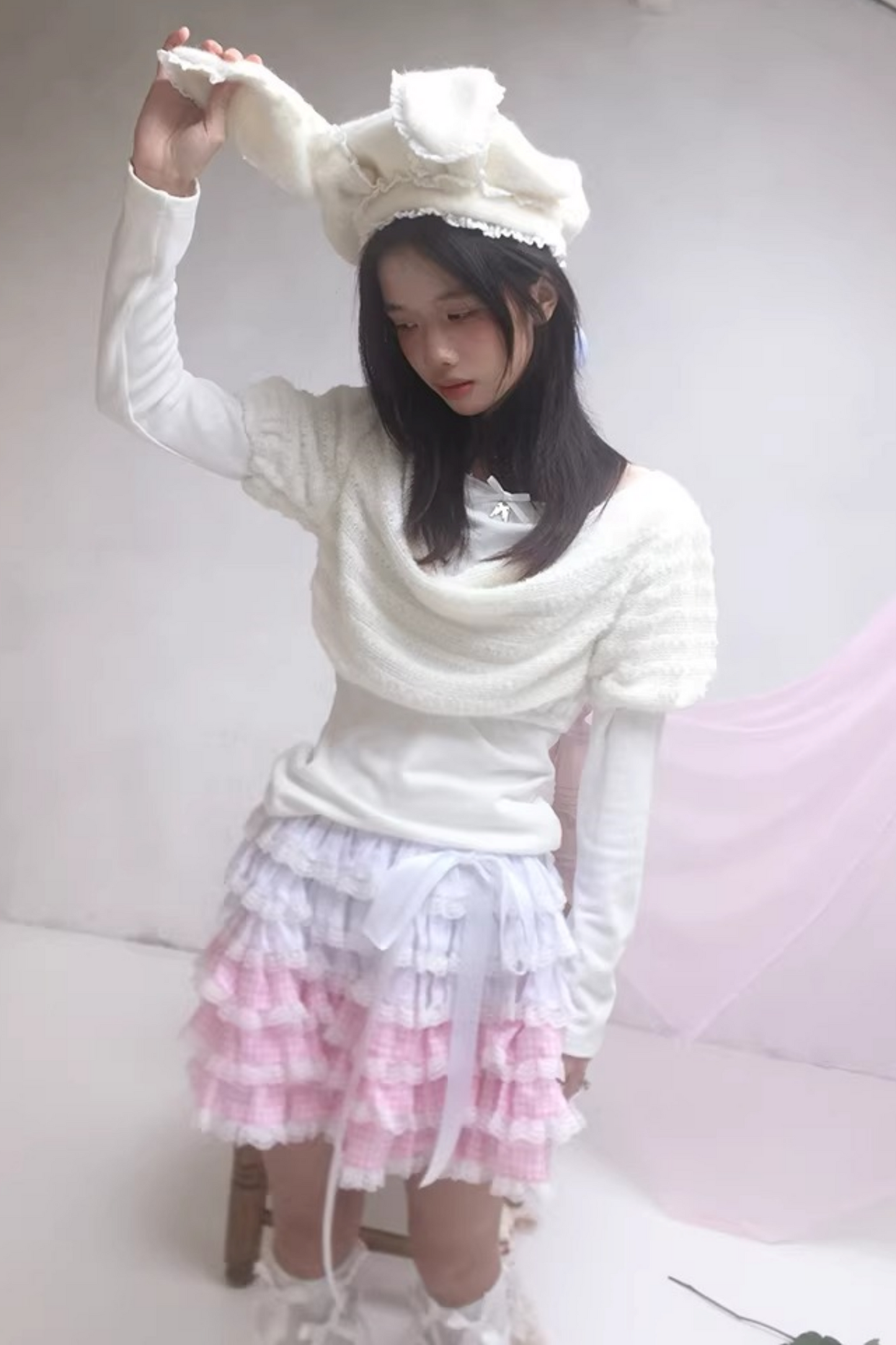 Gestricktes Oberteil mit drapiertem Kragen