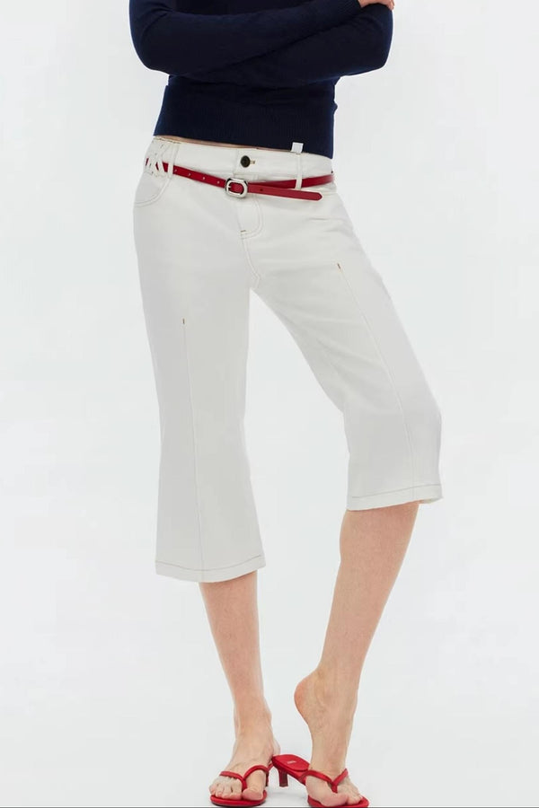 Classic white high-waisted flared jeans with unique stitching detail