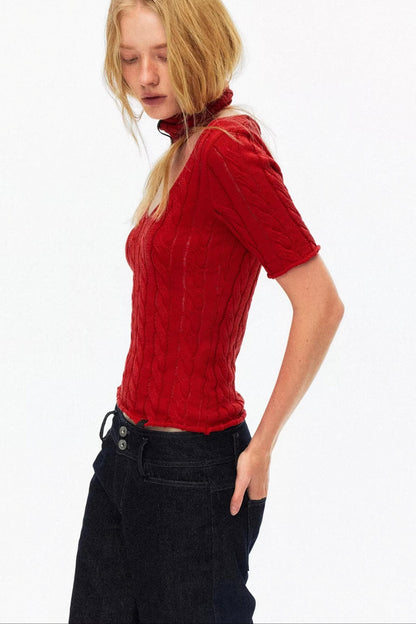 Vibrant red short sleeve cable knit top featuring a trendy choker neck